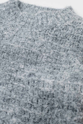 Maglione grigio oversize con maniche a palloncino