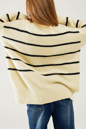 Maglione oversize color crema con righe nere