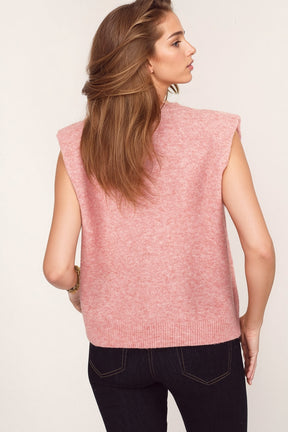 Maglione senza maniche rosa con cuori di paillettes argento