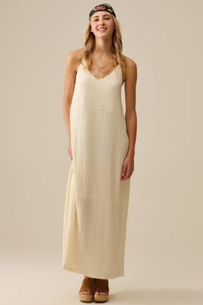 Maxi abito con cinturino posteriore con perline in crema