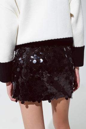 Minigonna con grandi paillettes in nero