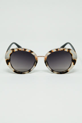Q2 Occhiali da sole ovali beige Sunset Spot