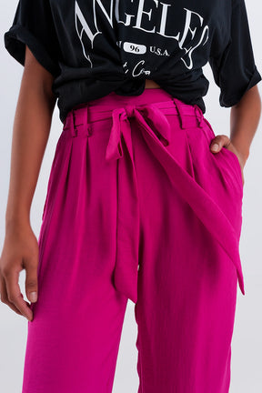 Pantaloni a fondo ampio con cintura fuchsia