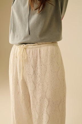pantaloni in pizzo a gamba larga con elastico in vita