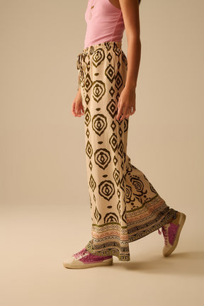 Pantaloni khaki a gamba larga con stampa boho