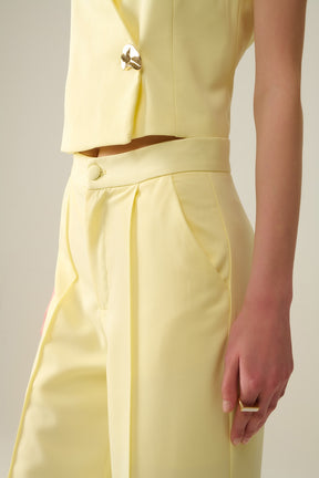 Pantaloni sartoriali a gamba larga in giallo