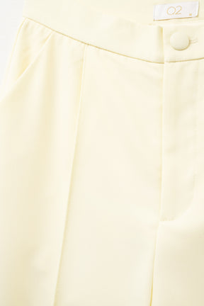 Pantaloni sartoriali a gamba larga in giallo