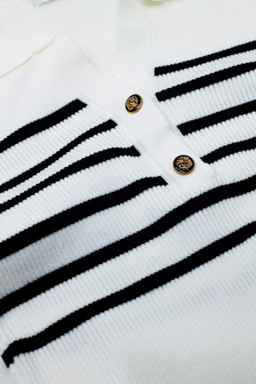 Polo a righe con bottoni in bianco