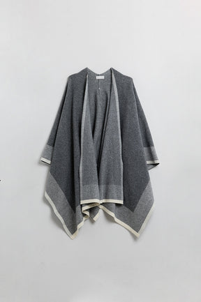 Poncho in maglia grigio con finiture ecru