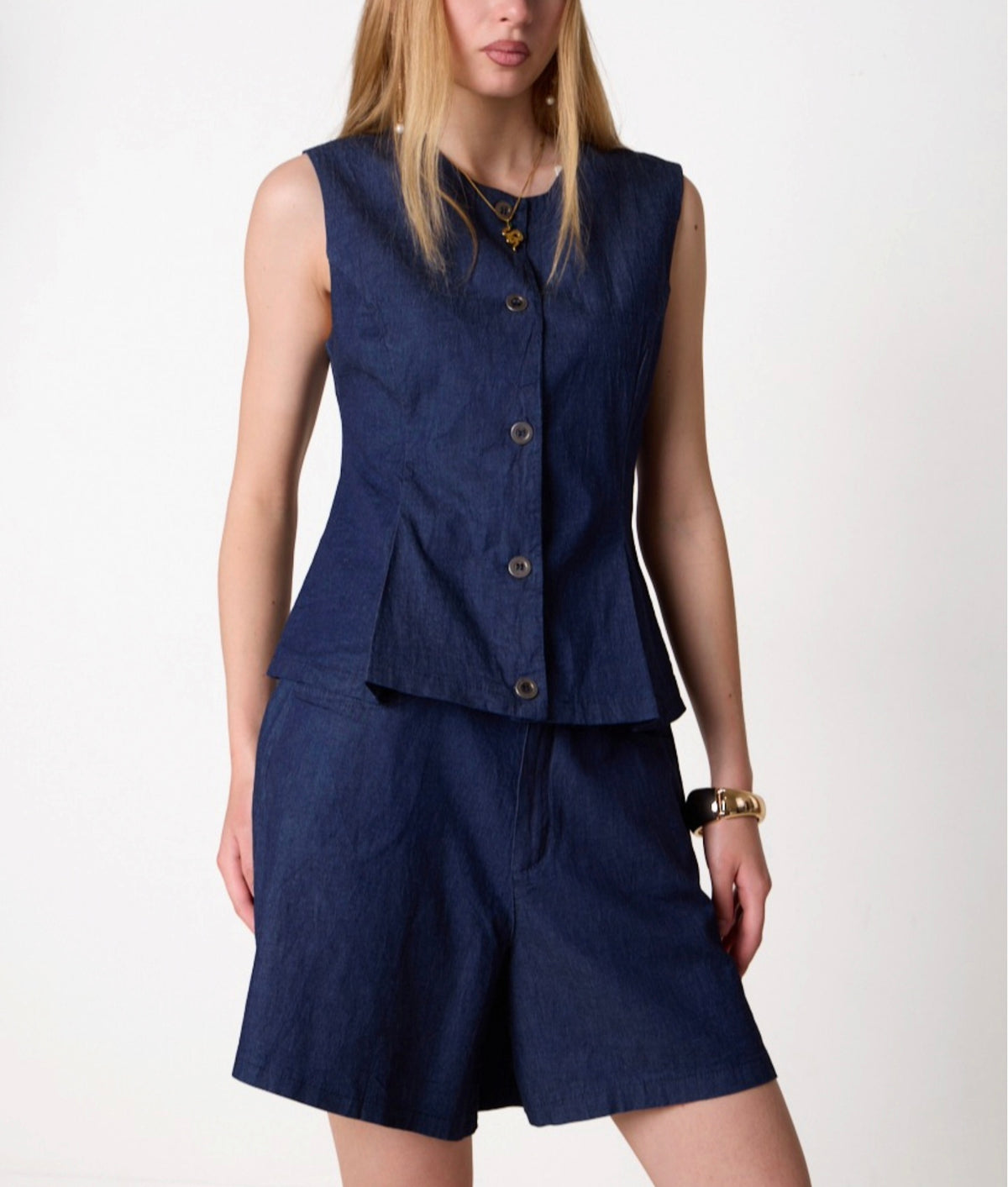 Completo shorts e gilet