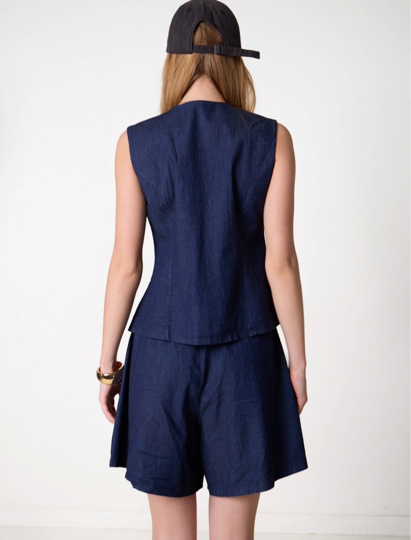 Completo shorts e gilet
