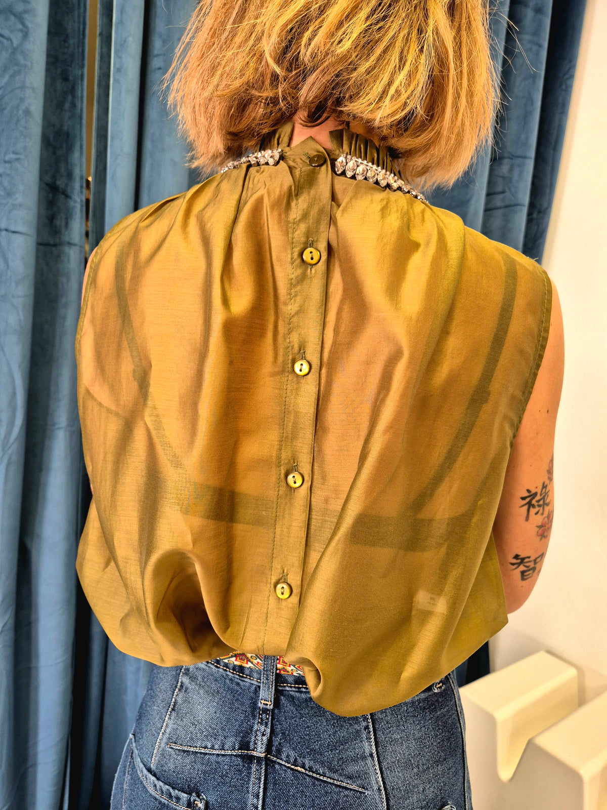 Blusa collo gioiello