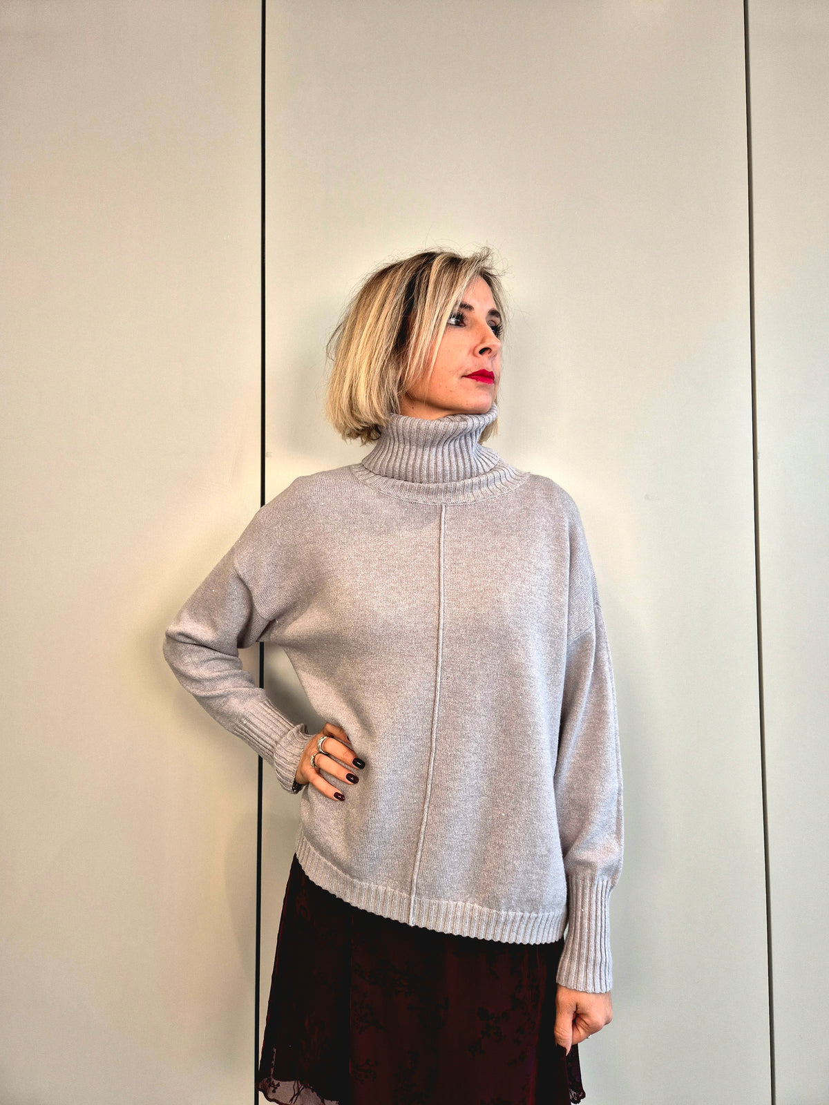 Maglia micro paillettes collo alto