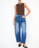 Jeans gamba curvata