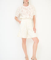 Completo pantaloncini e maglia pizzo