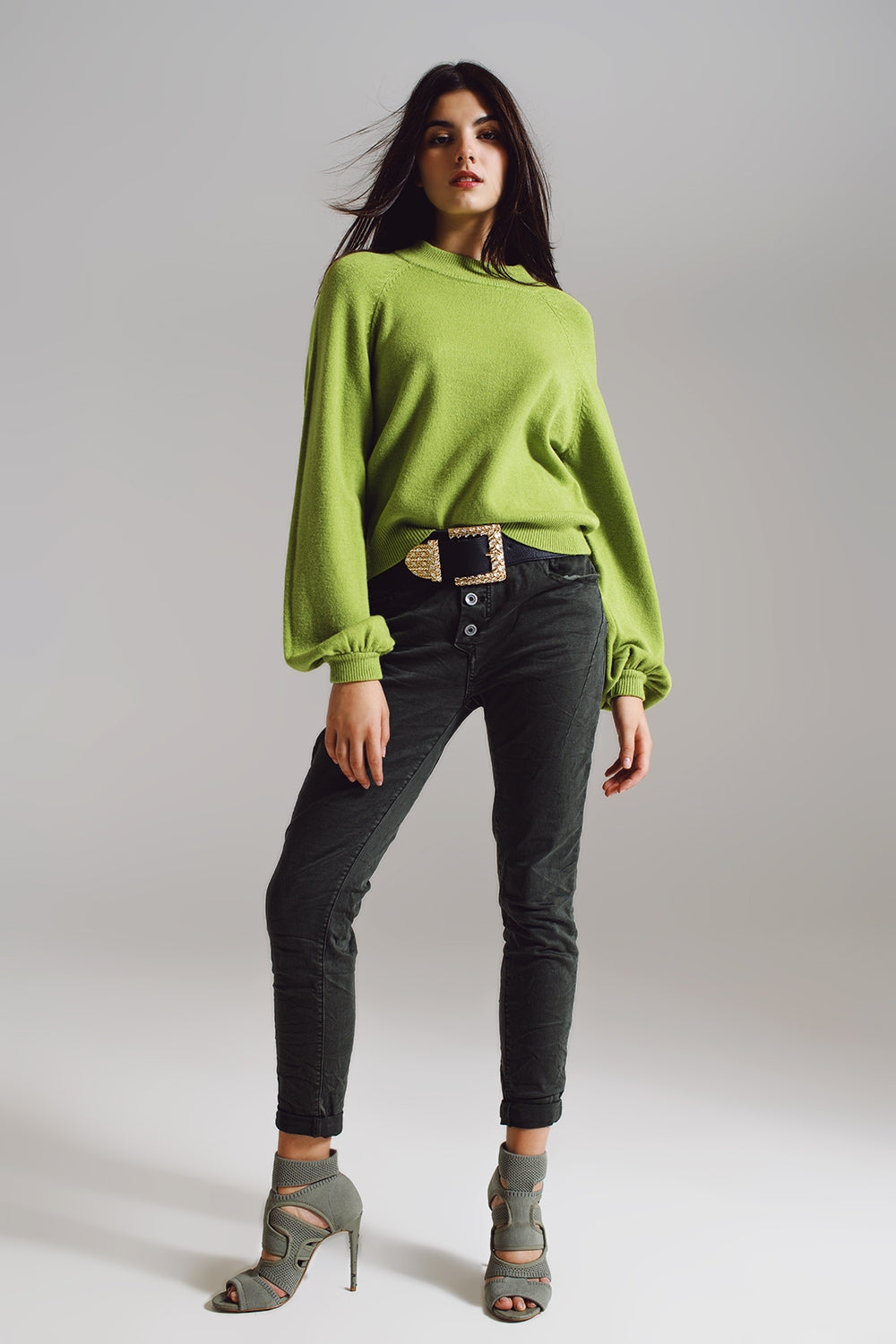 Skinny jeans con bottoni visibili in verde militare