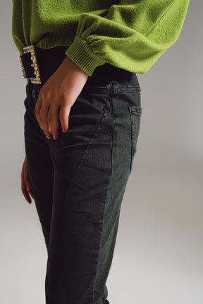 Skinny jeans con bottoni visibili in verde militare