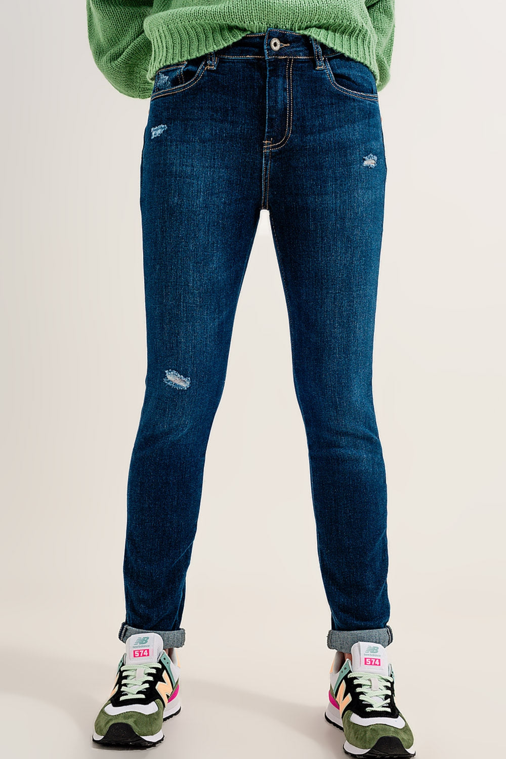 Skinny jeans tono blu medio con risvolti elasticizzato