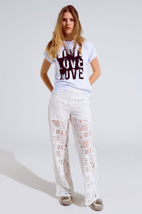T-shirt a manica corta con testo Love sul davanti in bianco