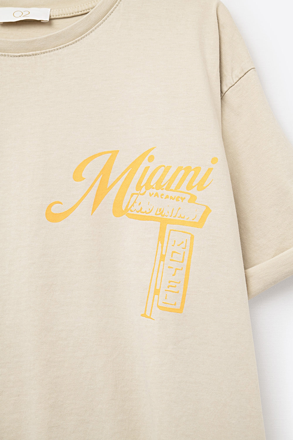 T-shirt beige con stampa del logo Miami