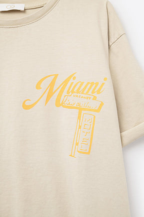 T-shirt beige con stampa del logo Miami