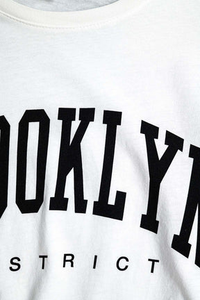 T-shirt bianca con scritta Brooklyn