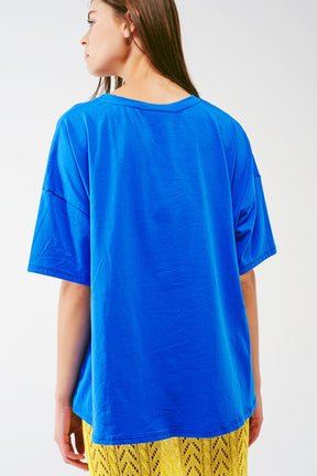 T-shirt blu ampia con orsetto colorato