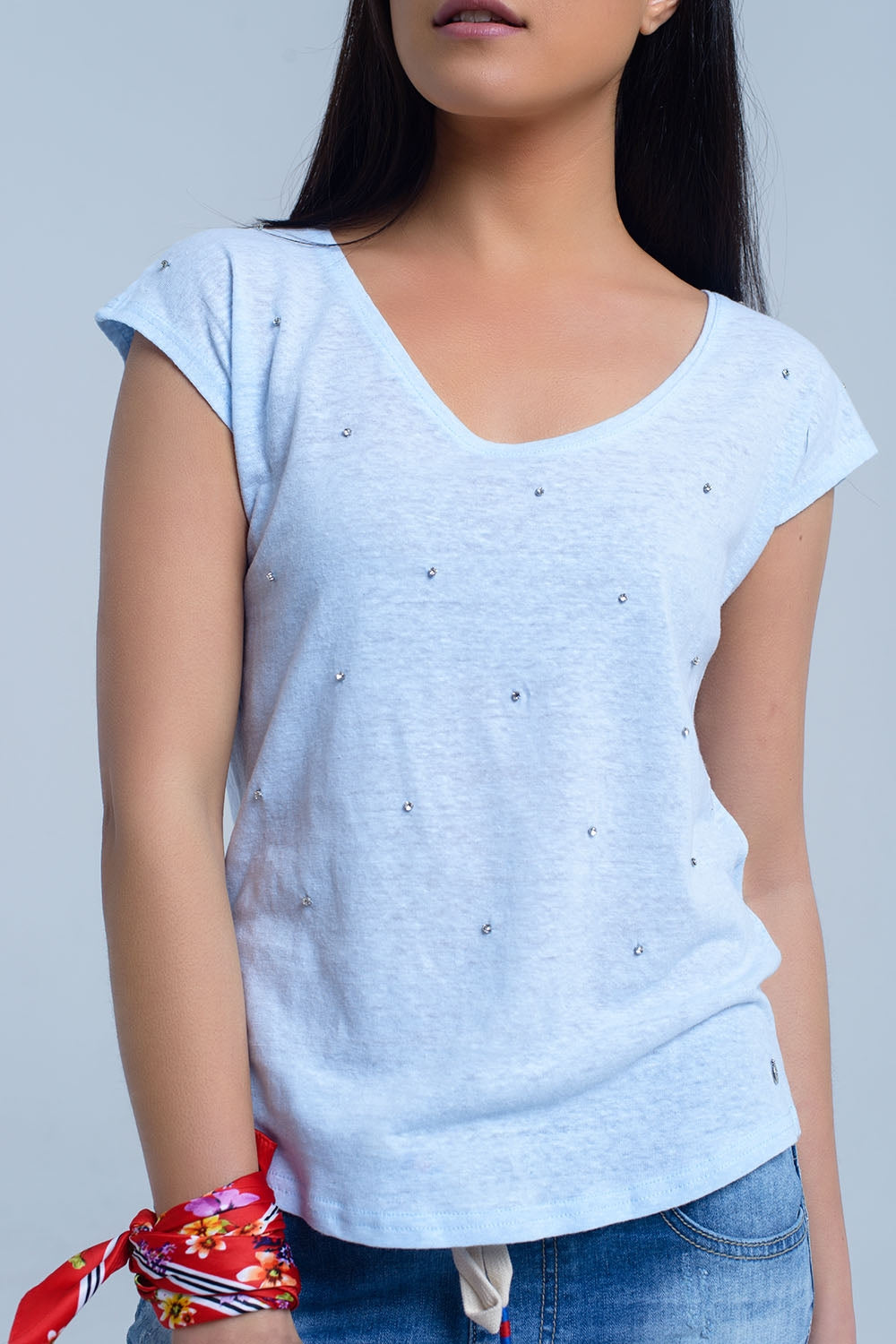 T-shirt blu con strass di cristallo