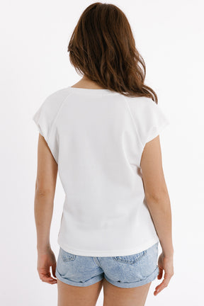 T-shirt girocollo con logo Love sul petto in bianco