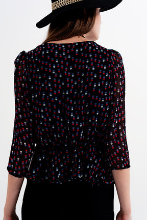 Top chiffon a pois color nero