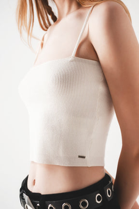 Top con bretelle in maglia a coste panna