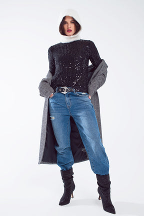 Top con paillettes a maniche lunghe in nero