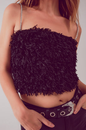 Top corto color nero con piume
