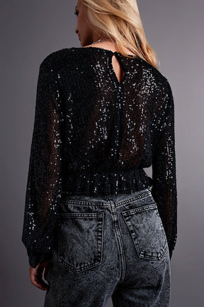 Top corto nero con paillettes scollo incrociato