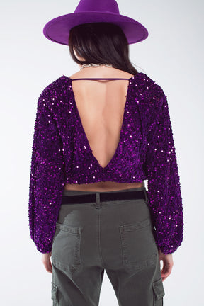 Top in paillettes viola con maniche a palloncino con scollo a V e schiena scoperta