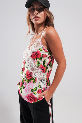 Top in raso con finiture in pizzo e stampa di rose