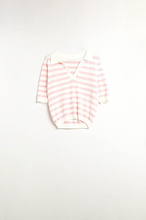 Top polo in maglia bianca con strisce rosa