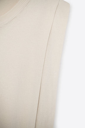 Top senza maniche in maglia con drappeggio sulle spalle in beige