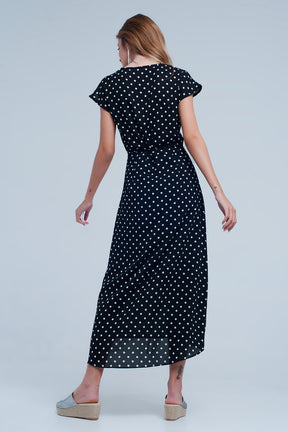 Vestito midi nero a portafoglio con motivo a pois misti e taglio asimmetrico